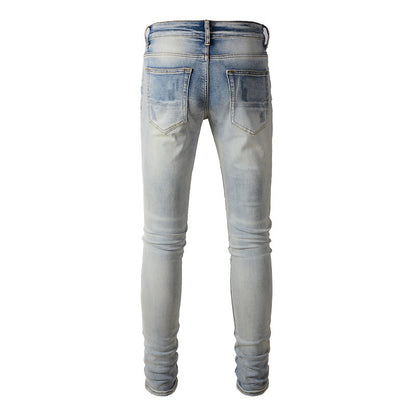 Jean déchiré Street Tide européen et américain épuisé Pantalon slim High Street Tide en denim