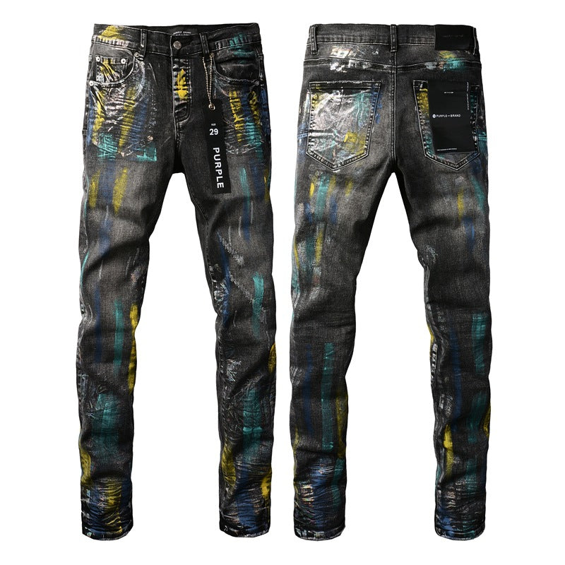 Fashionable Black Jeans with Bold Colorful Paint and Graffiti Detailing